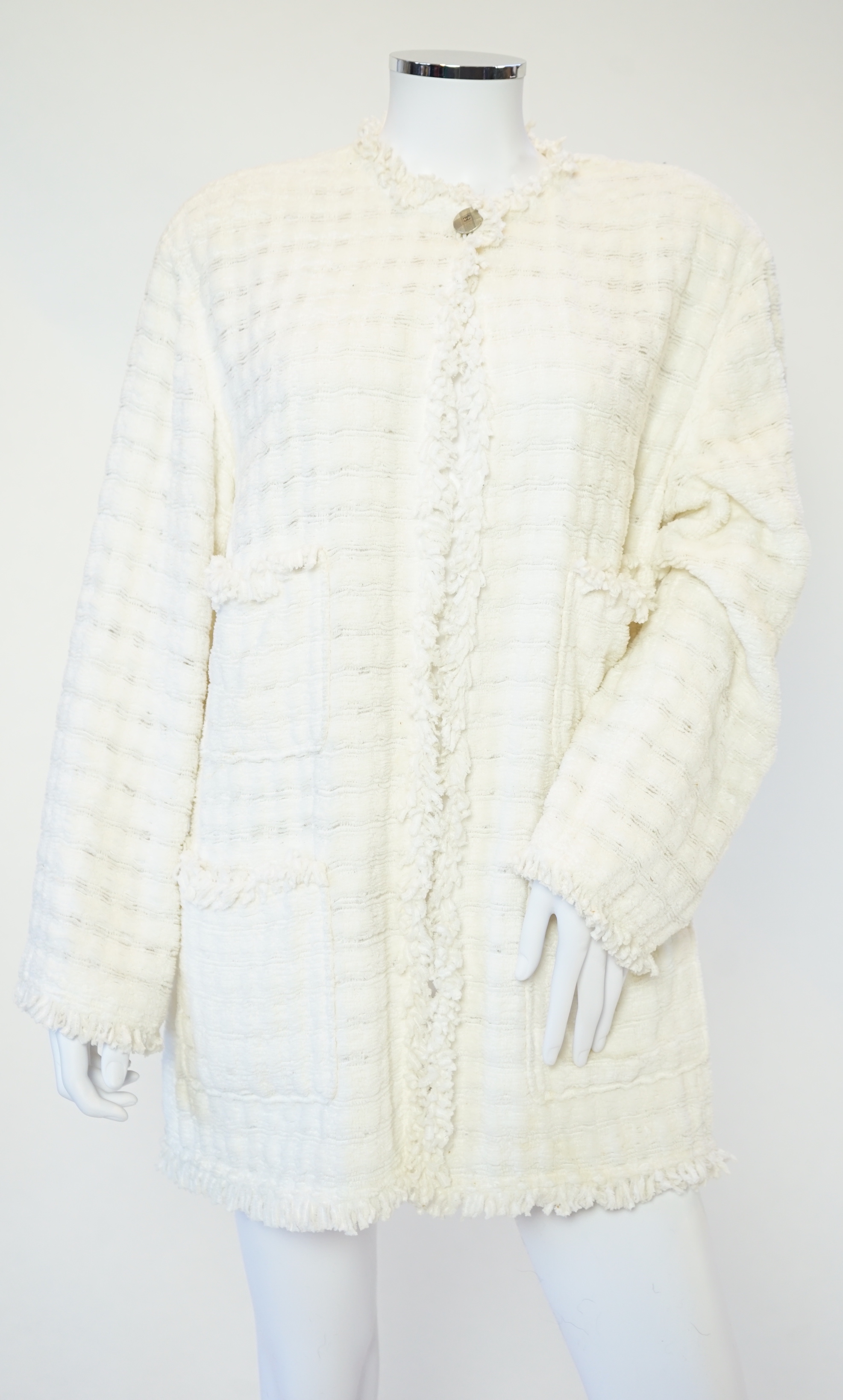A Chanel early 1990's cream boutique jacket, size 40